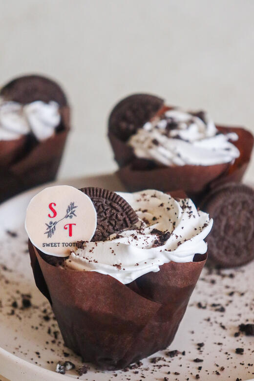 Experience ultimate Oreo® bliss with our Cookies & Cream Cake. Sink your teeth into a moist & flavorful vanilla cake dotted with crushed cookies, topped with a dreamy cream frosting and of course Oreo dust and a little cookie for crunch!. Each bite deliver