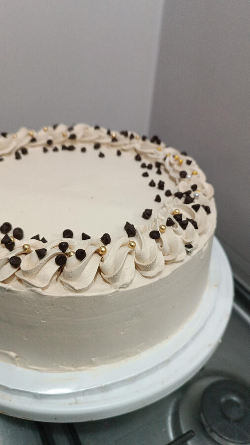 1kg of our Chocolate cake, with mocha frosting is a treat for the senses, amazing for any event! A coffee and chocolate lovers lover's dream.