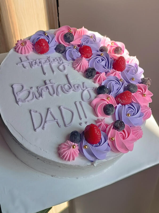 Experience a berry explosion in every bite with our Very Berry Cake. This exquisite treat features a light and fluffy raspberry cake, filled with a delightful mixed berry jam filling, and crowned with a luscious blueberry frosting. The combination of tangy