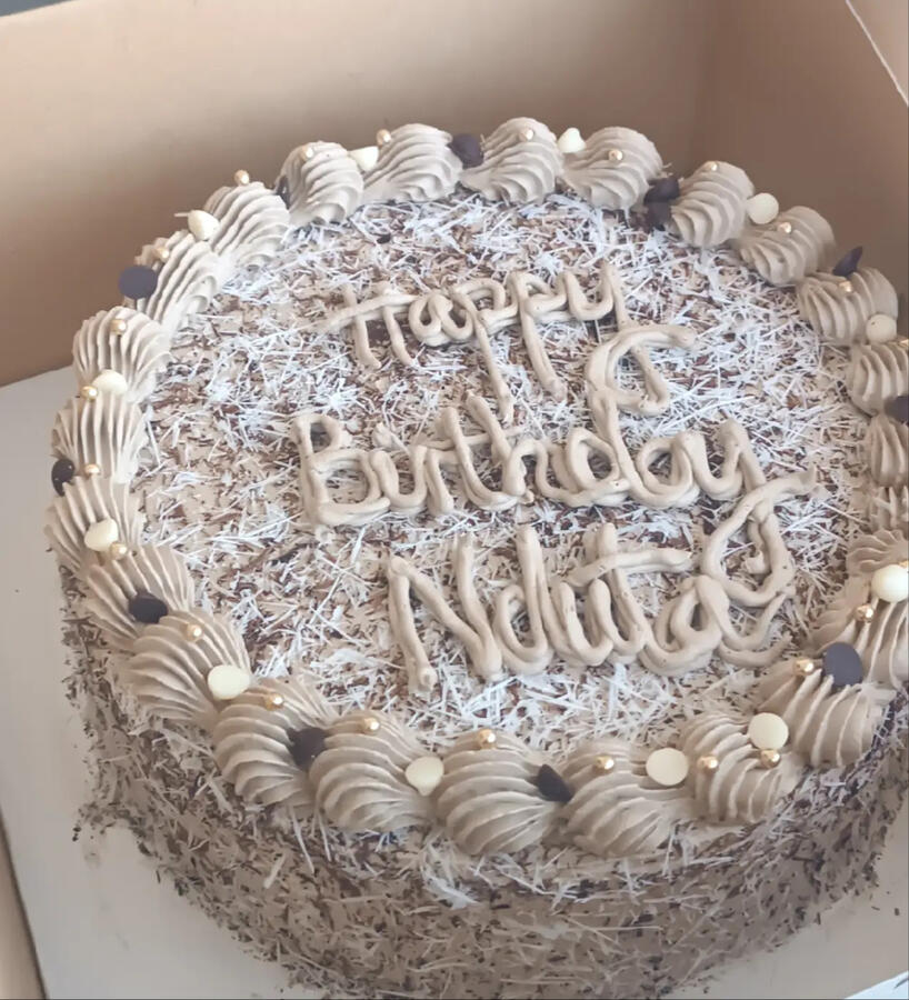 our Chocolate cake, with chocolate frosting, filled with both dark and white chocolate chips, as well as shavings is a show stopper, for the chocolate lover!